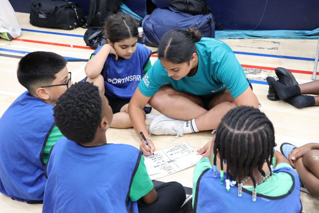 SportInspired team member running the Youth Voice station at one of the multi-sports festivals in London